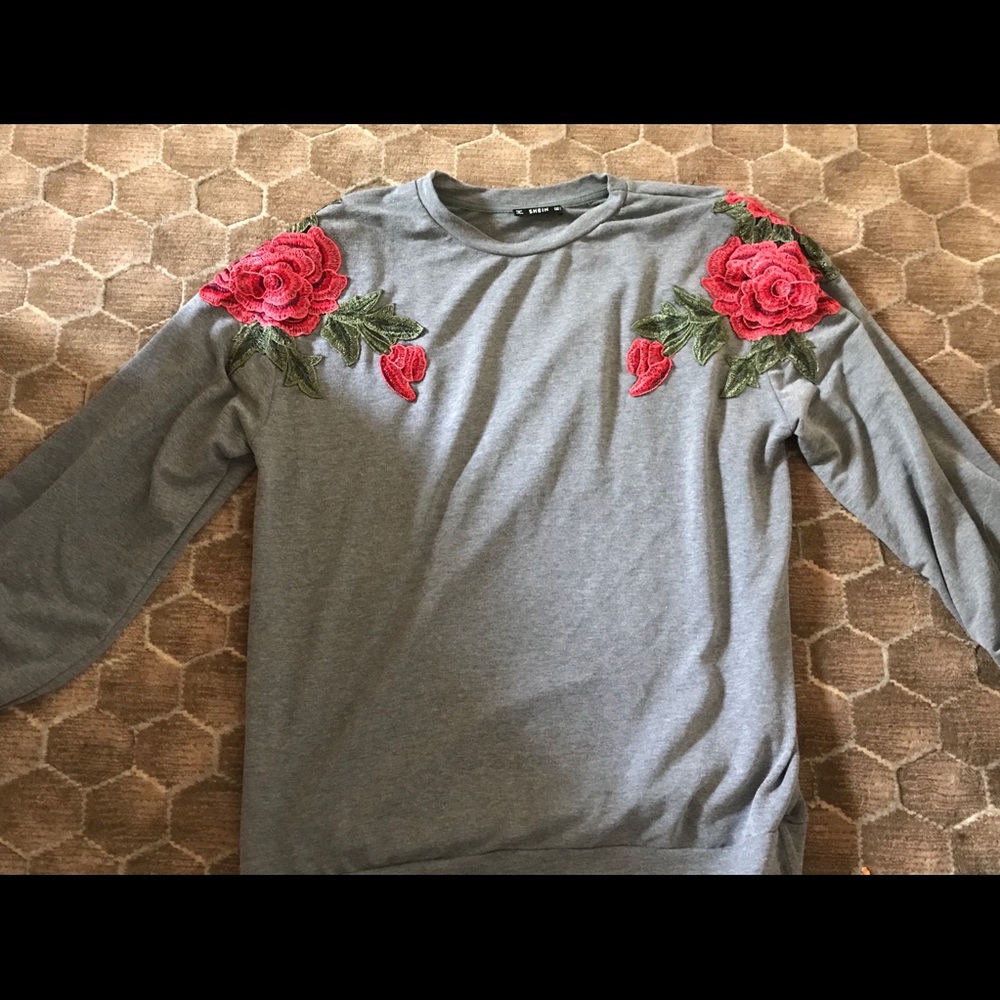 Rose embellished sweater w/ puffy sleeves.Like new